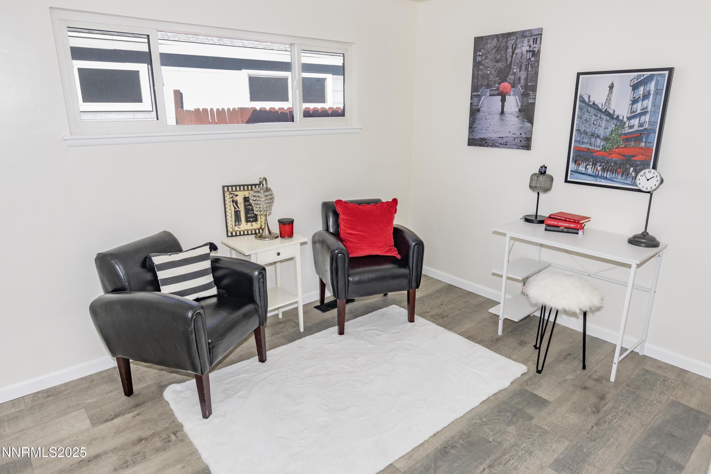 1570 Radcliffe Drive Reno, NV 89502 - Photo 3 of 11 a living room with furniture and a chair