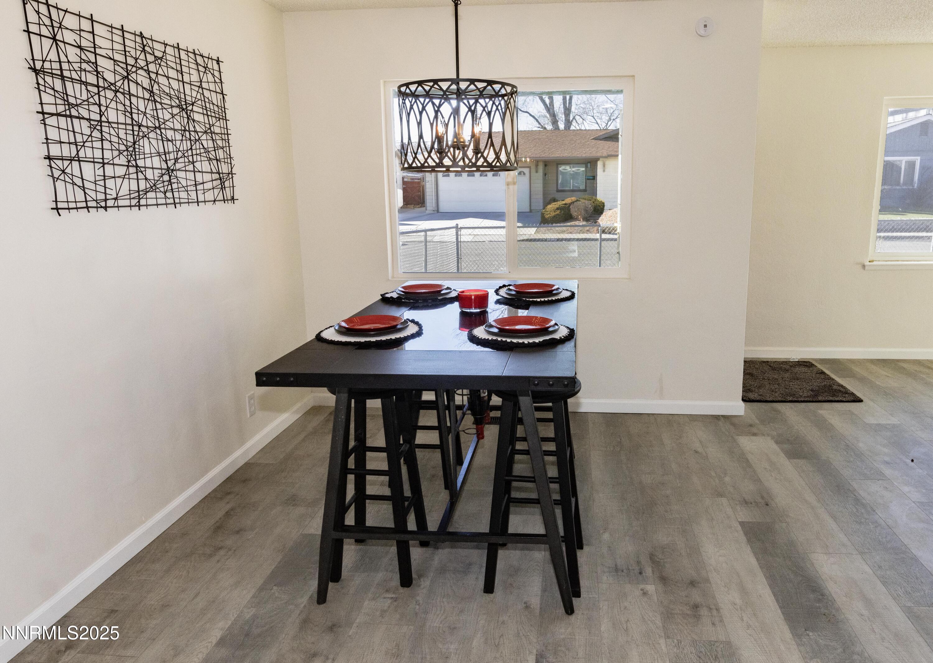 1570 Radcliffe Drive Reno, NV 89502 - Photo 8 of 11 a dining room with furniture and window