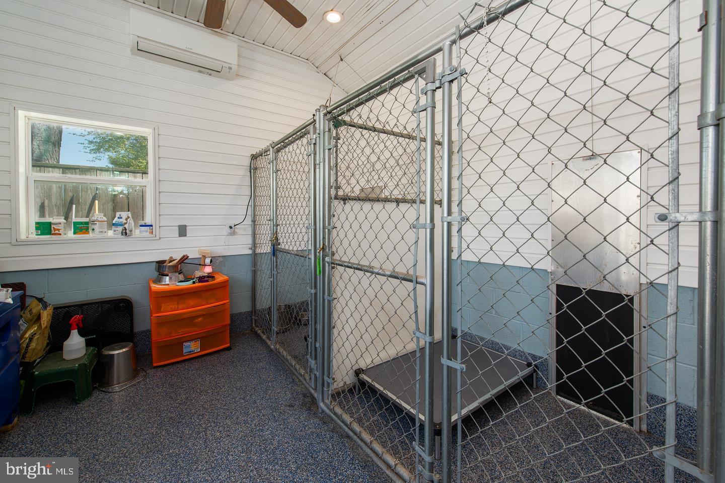 18473 Joseph Road Milton, DE 19968 - Photo 44 of 51 Canine kennel with outside access