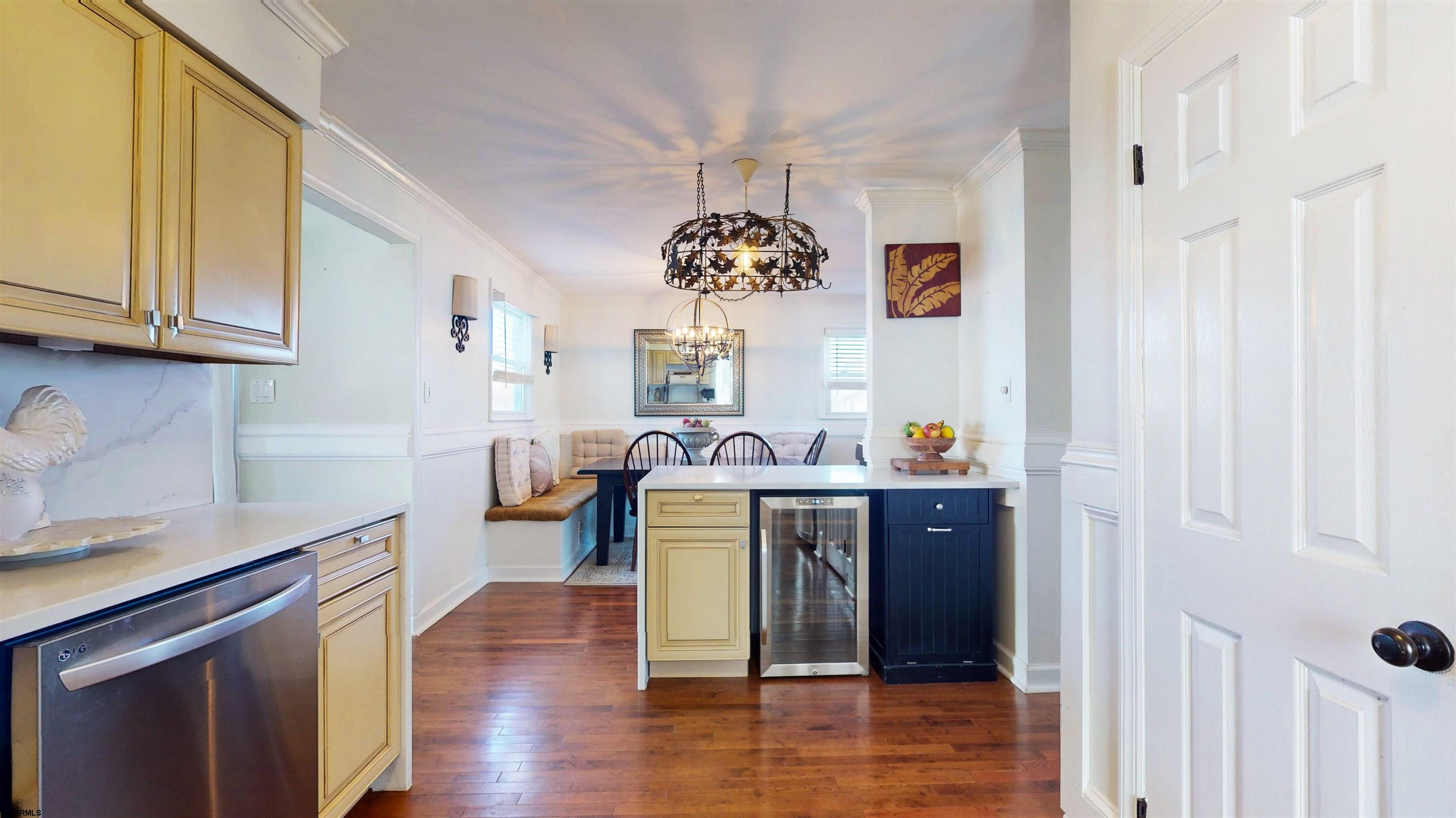 5201 Waterview Drive Brigantine, NJ 08203 - Photo 15 of 33 a view of living room with wooden floor windows and furniture