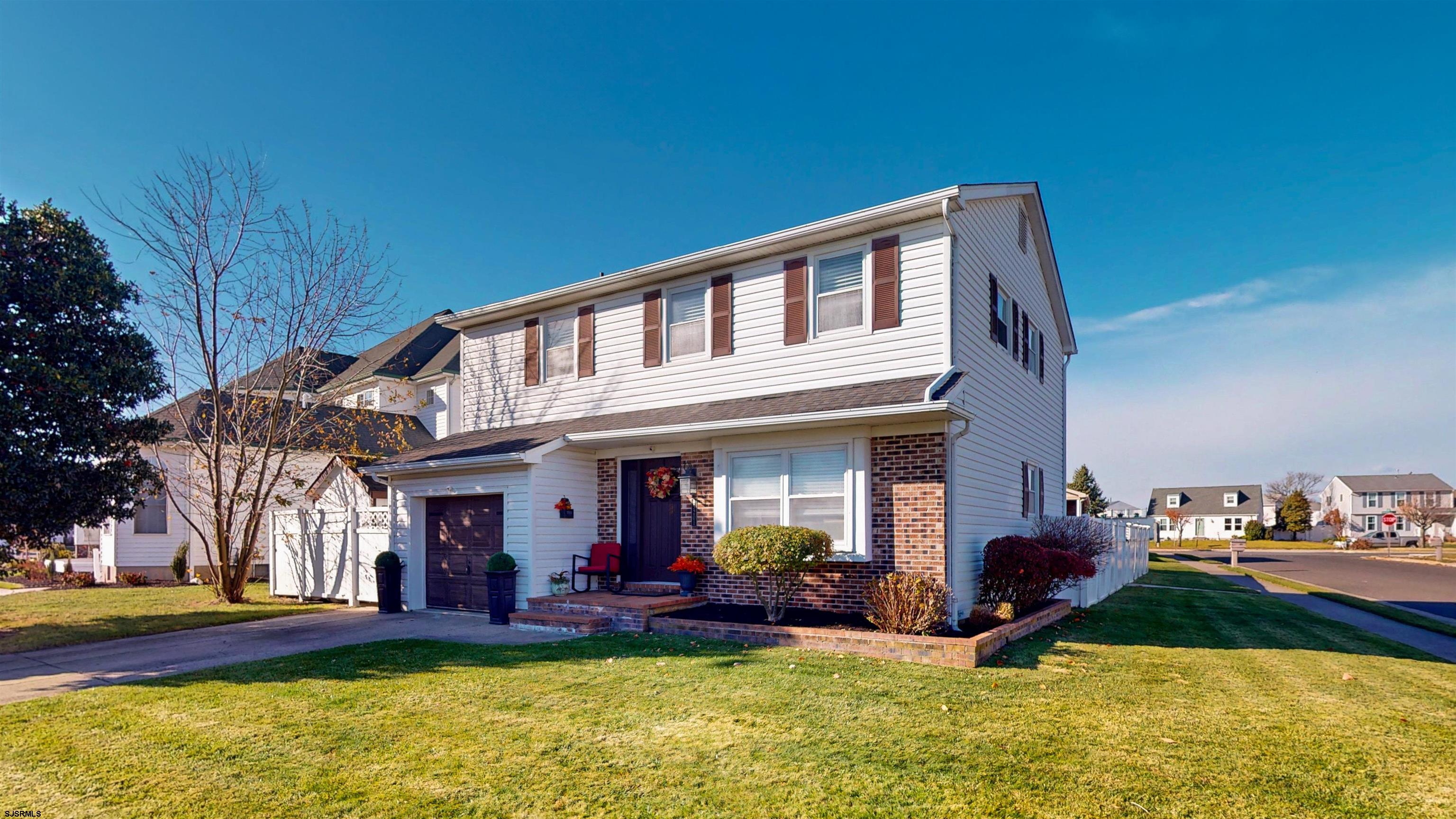 5201 Waterview Drive Brigantine, NJ 08203 - Photo 2 of 33 a view of a house with backyard porch and furniture