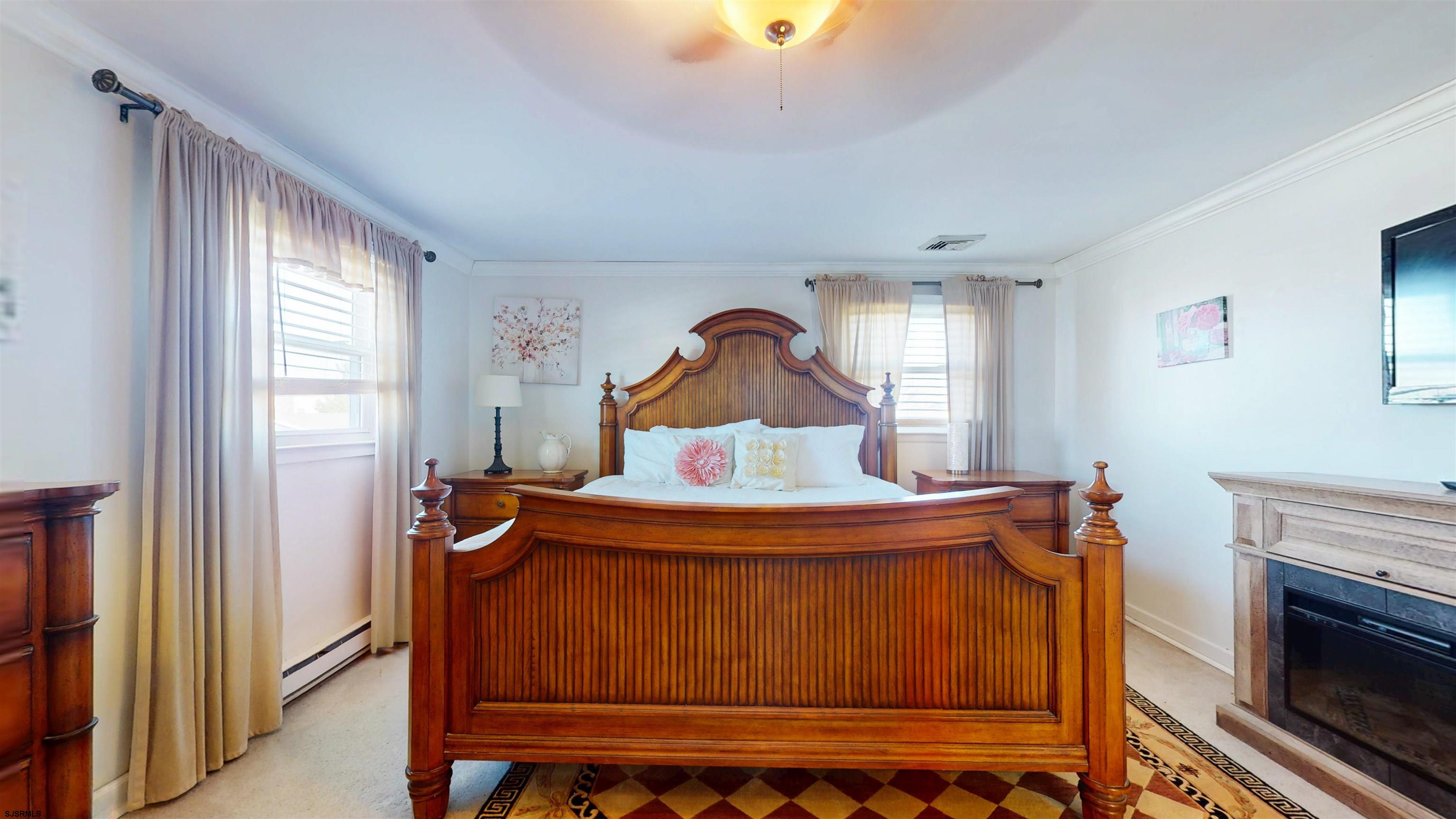 5201 Waterview Drive Brigantine, NJ 08203 - Photo 24 of 33 a view of a bedroom with furniture window and front door