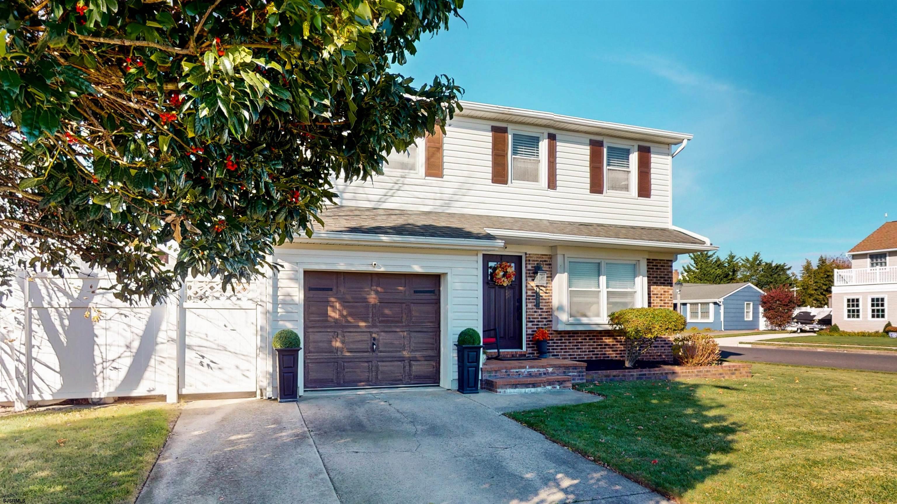 5201 Waterview Drive Brigantine, NJ 08203 - Photo 3 of 33 a view of a house with patio