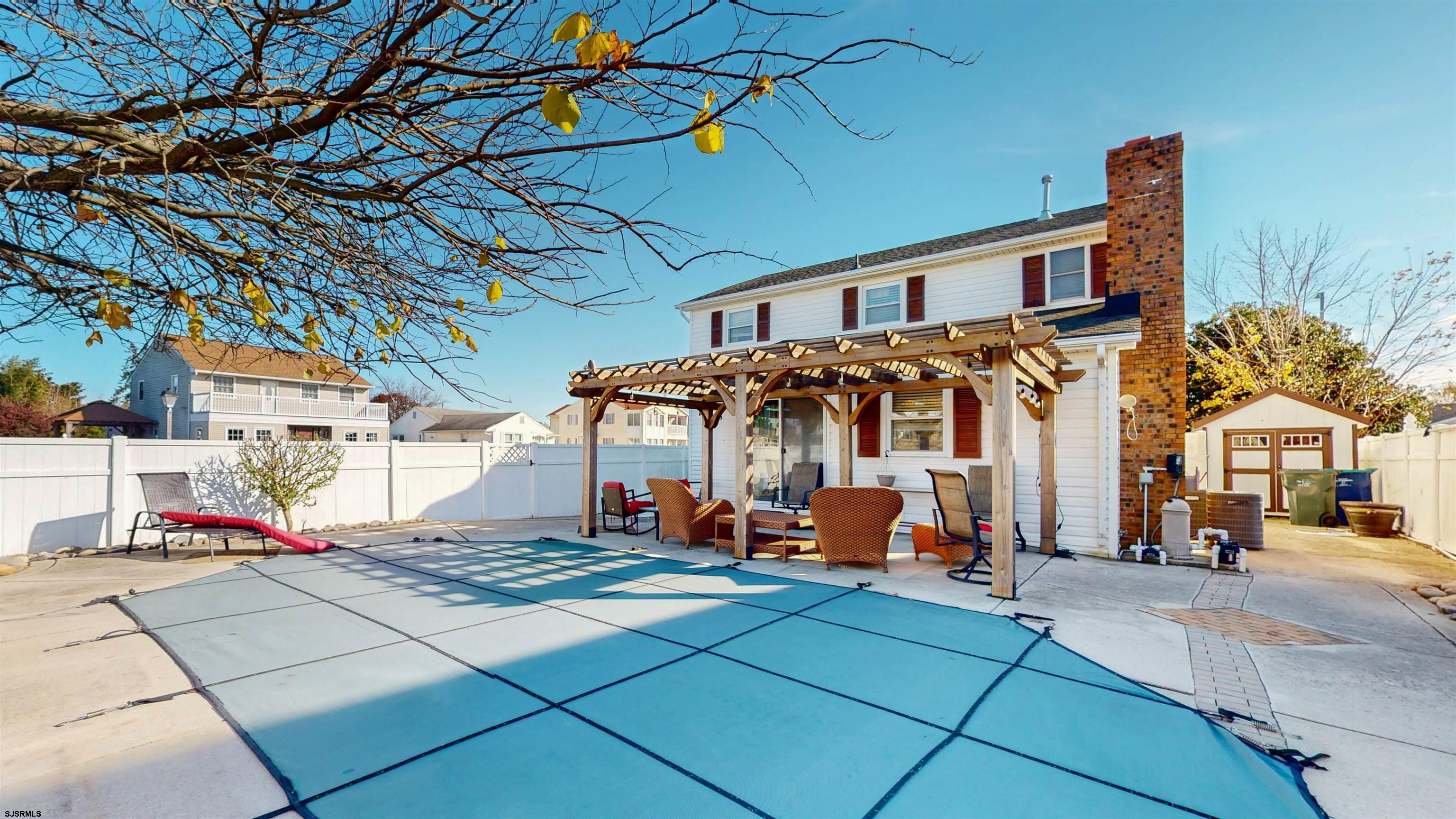 5201 Waterview Drive Brigantine, NJ 08203 - Photo 7 of 33 a front view of a building with utility room