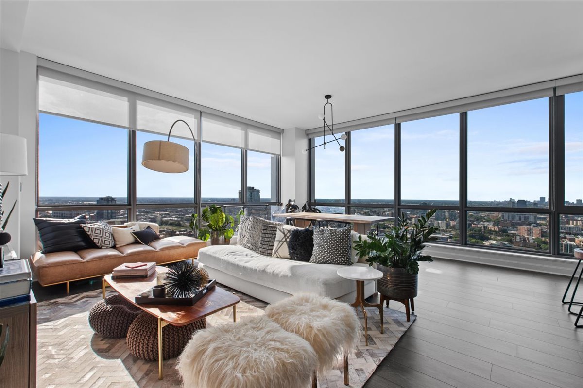 Undisclosed Address Chicago, IL 60607 - Photo 5 of 18 a living room with furniture and a large window