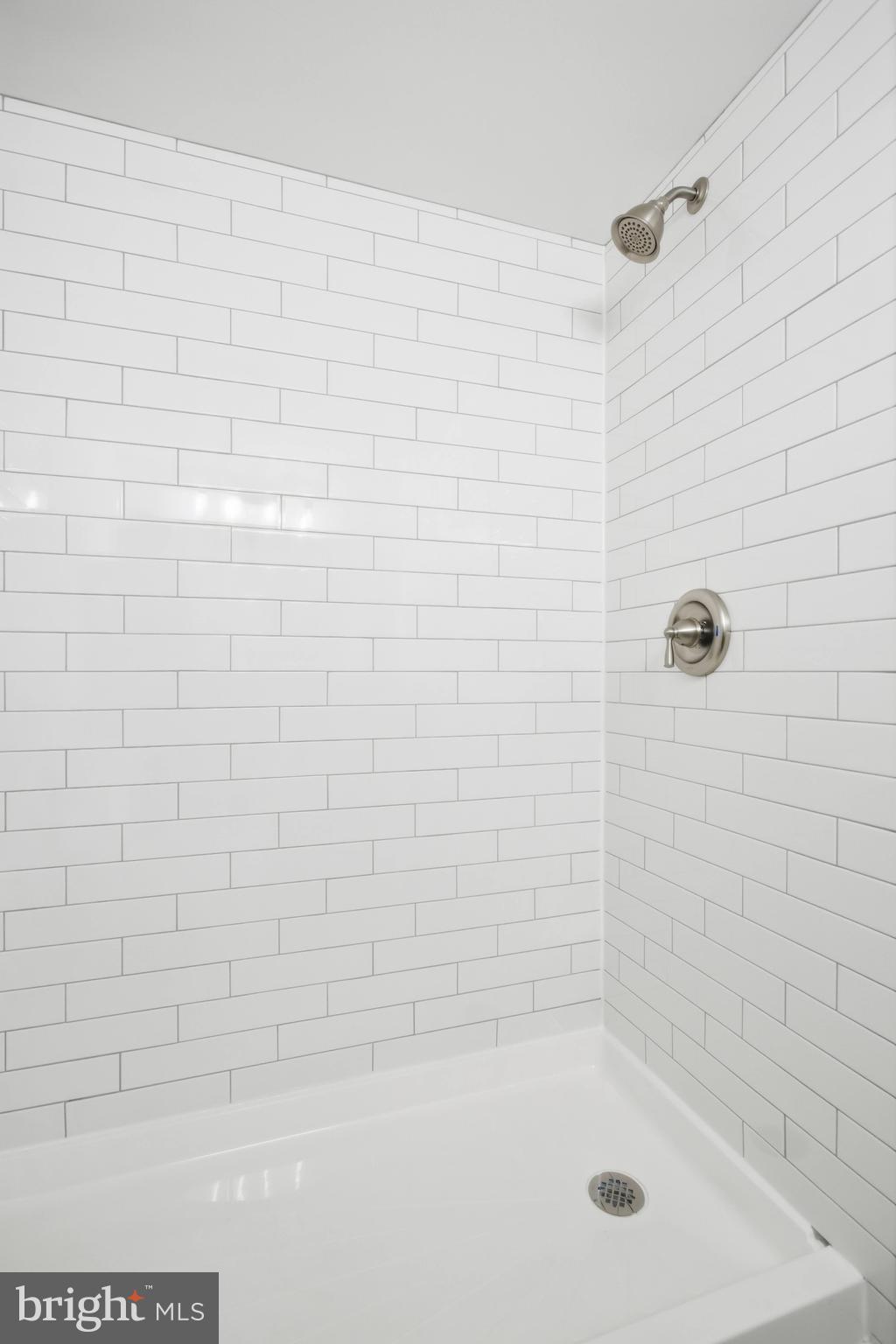 5902 Cove Landing Road, Unit 202 Burke, VA 22015 - Photo 11 of 52 a bathroom with a shower
