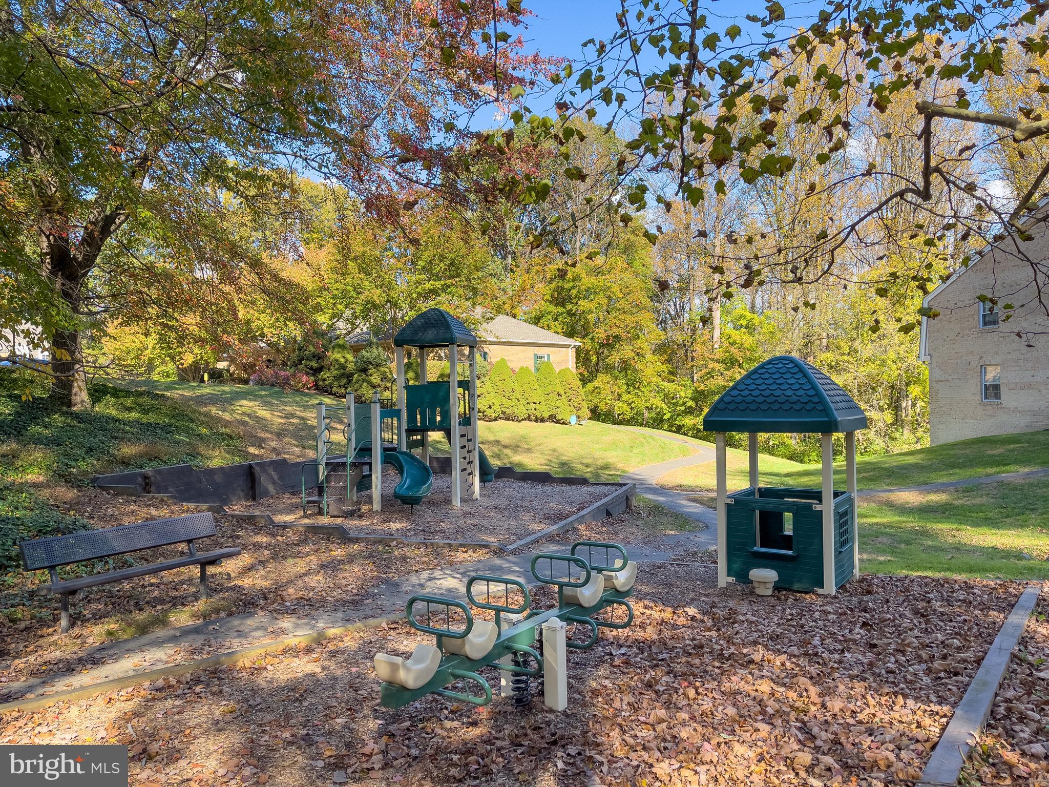 5902 Cove Landing Road, Unit 202 Burke, VA 22015 - Photo 48 of 52 a front view of a house with a yard
