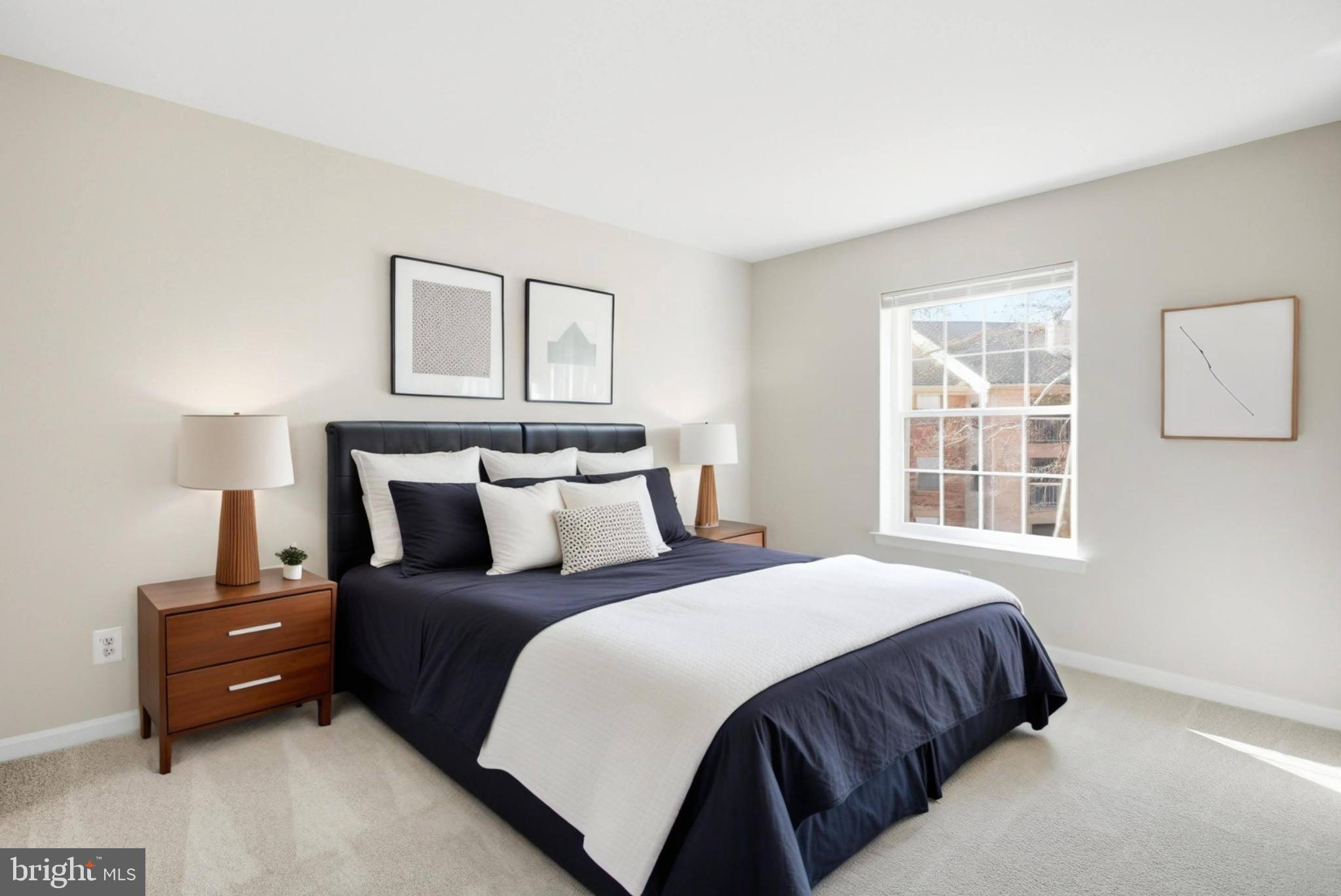 5902 Cove Landing Road, Unit 202 Burke, VA 22015 - Photo 9 of 52 a bedroom with a bed and a window