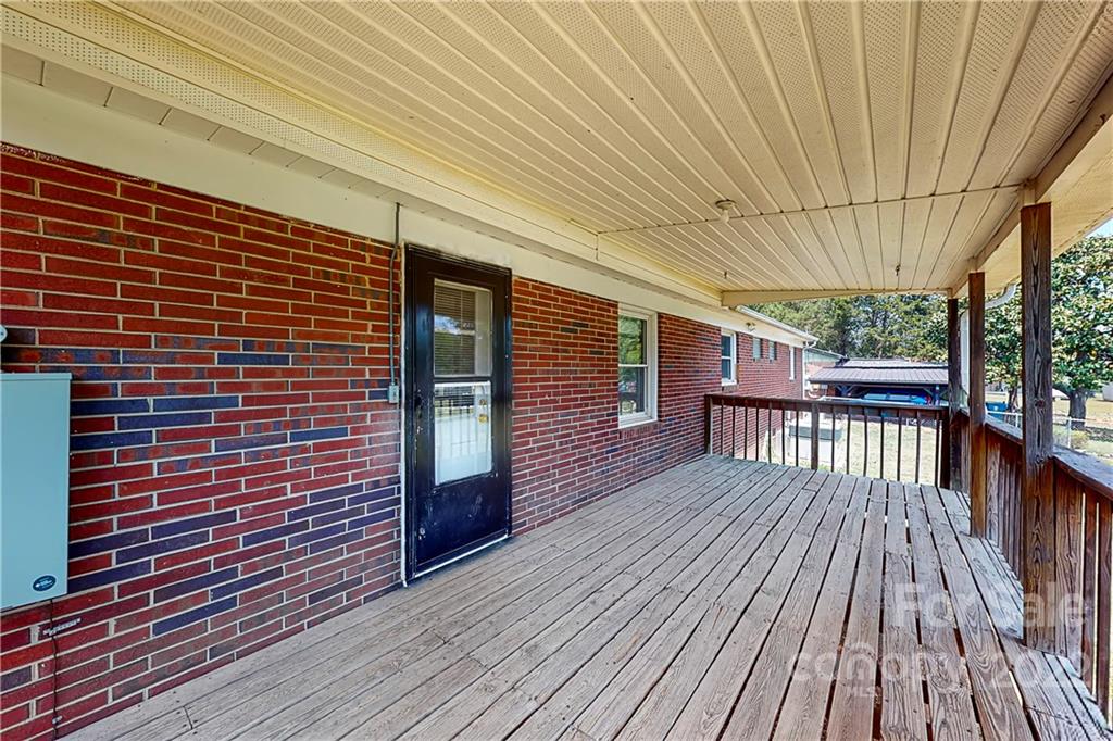 6334 Miller Road Kannapolis, NC 28081 - Photo 4 of 35 a view of wooden balcony with a sink