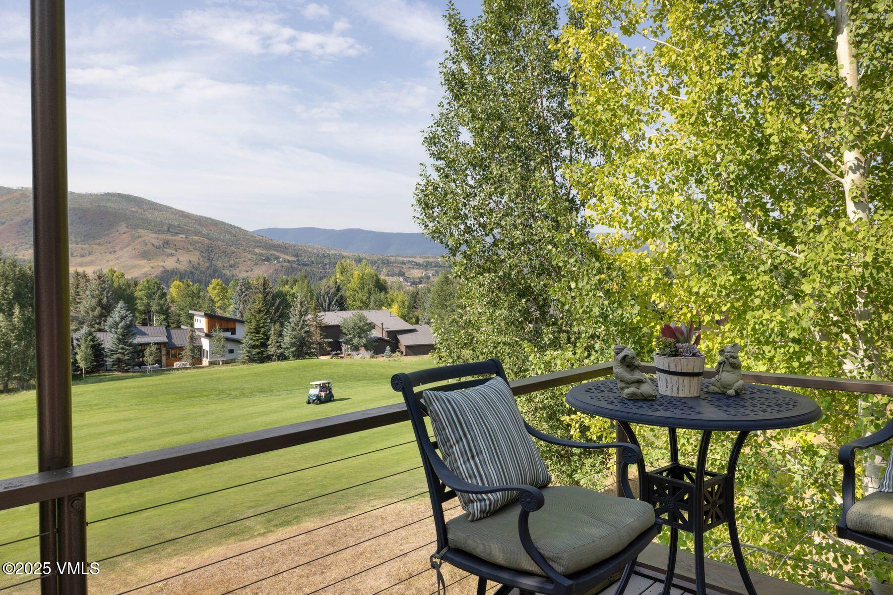 470 Winslow Road Edwards, CO 81632 - Photo 16 of 33 a view of a chairs and table in patio with a yard