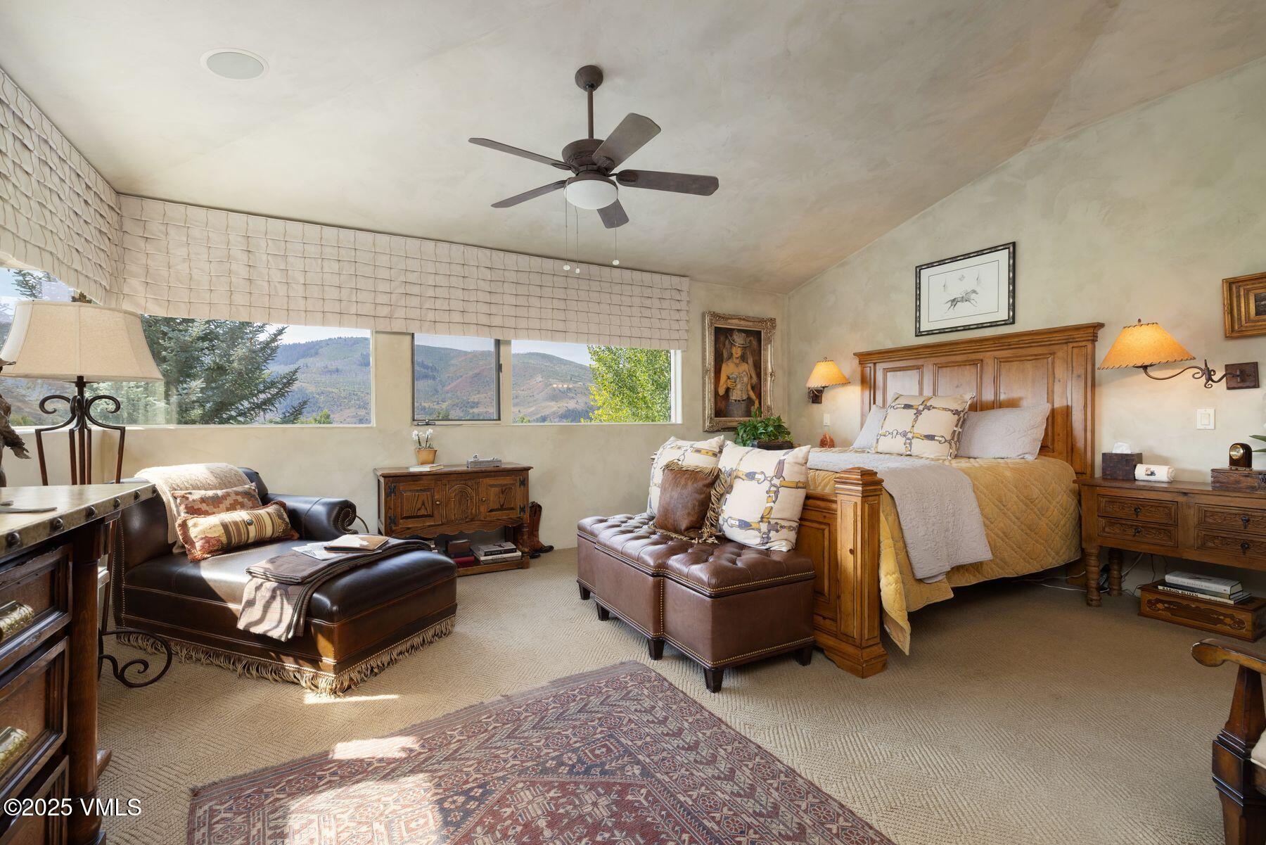 470 Winslow Road Edwards, CO 81632 - Photo 19 of 33 a bedroom with bed couch and window