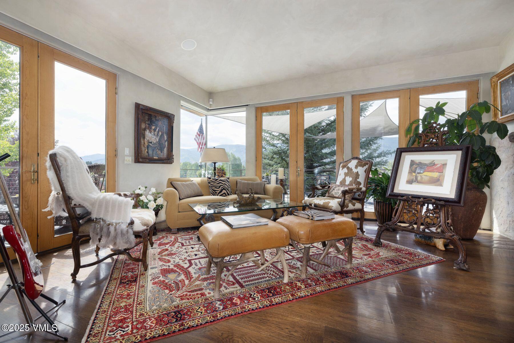 470 Winslow Road Edwards, CO 81632 - Photo 2 of 33 a living room with furniture large window and a table
