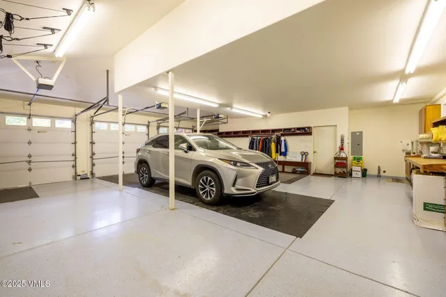 an aerial view of a house with a yard and a garden