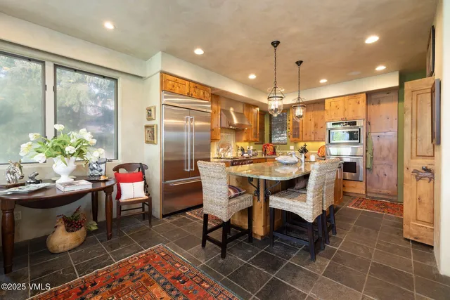 a view of a dining room with furniture
