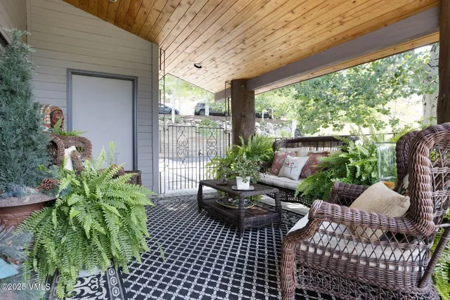 a view of a patio filled with furniture