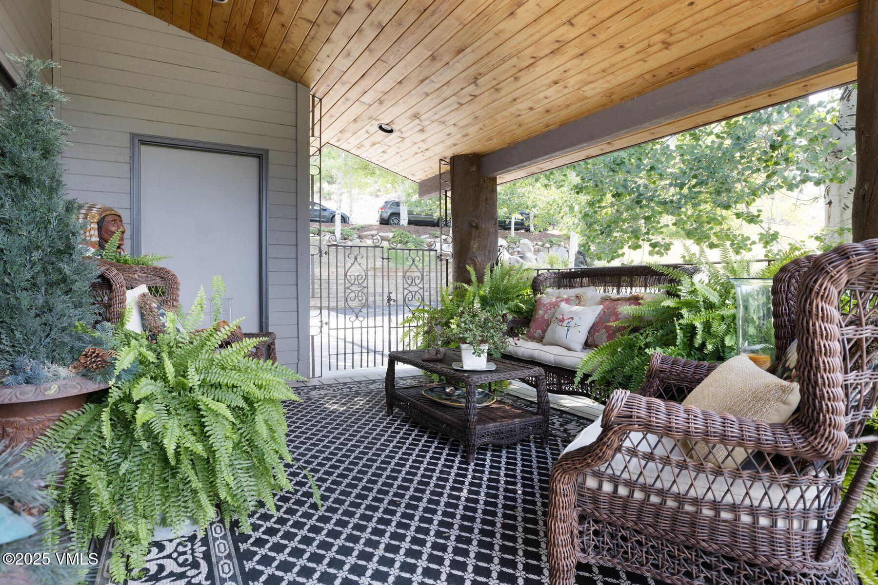470 Winslow Road Edwards, CO 81632 - Photo 9 of 33 a view of a patio filled with furniture