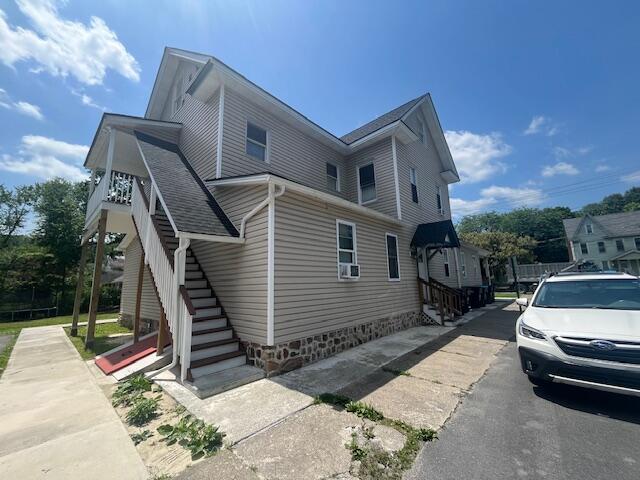 a car parked in front of a house