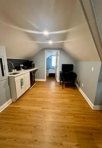 a view of kitchen with wooden floor