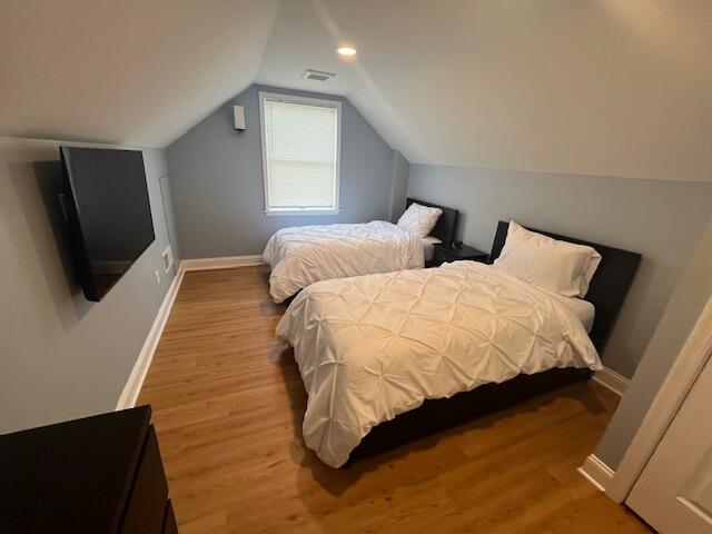 100 Broad Street, Unit E Stroudsburg, PA 18360 - Photo 19 of 25 a bedroom with two beds and a flat screen tv