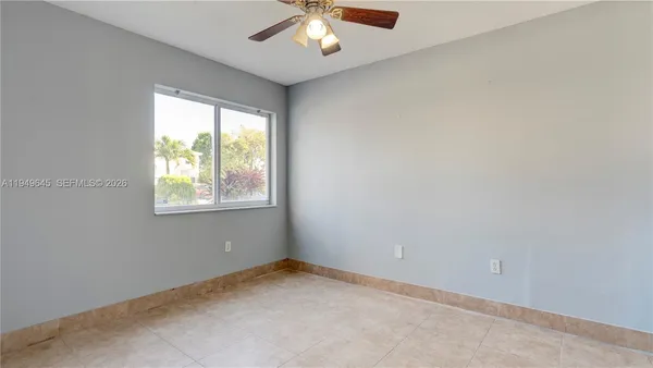 an empty room with a window