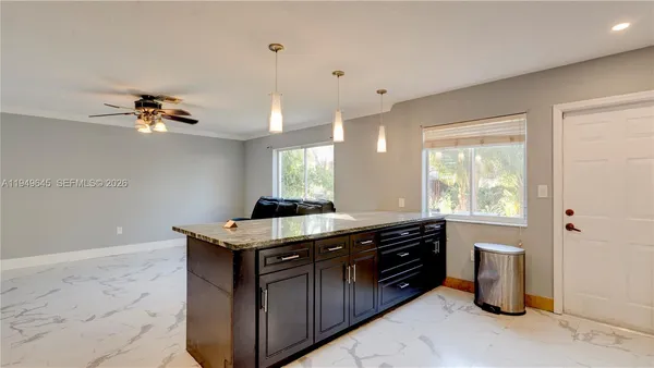 a kitchen with a stove and a sink