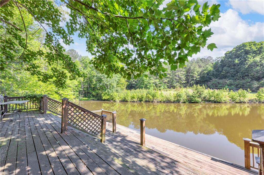 1641 Churchwell Rd Union Point Union Point, GA 30669 - Photo 11 of 45 a view of a wooden deck with lake view