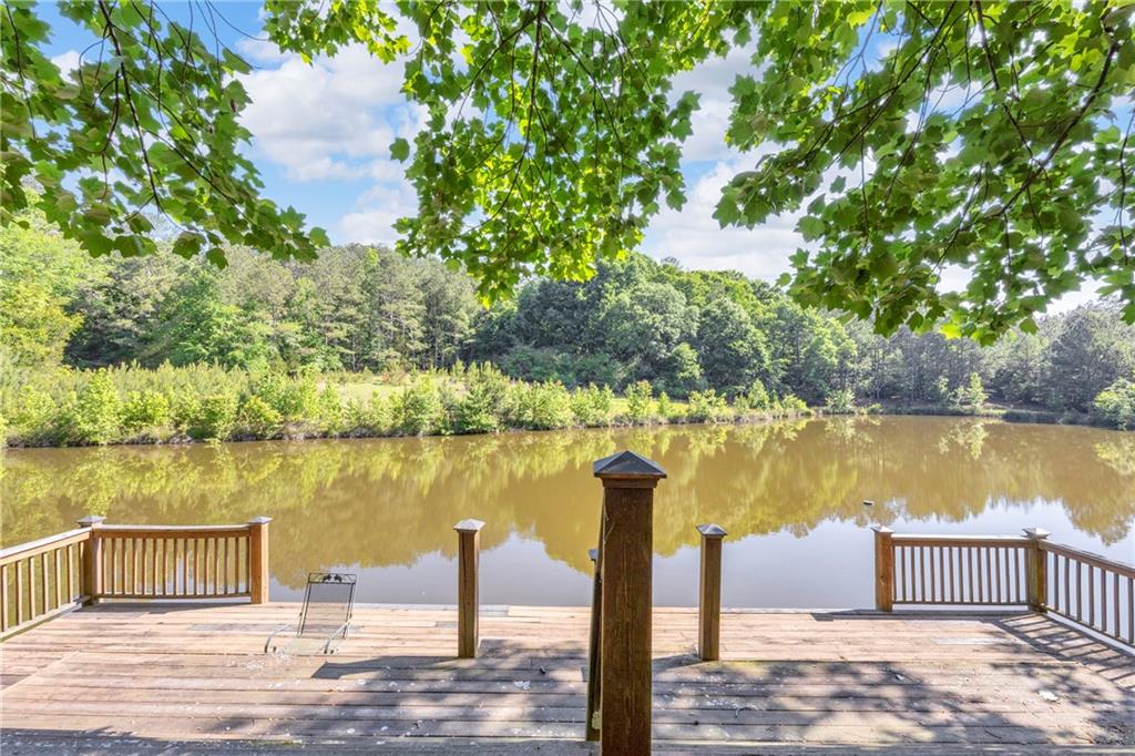1641 Churchwell Rd Union Point Union Point, GA 30669 - Photo 13 of 45 a view of a lake with boats and trees
