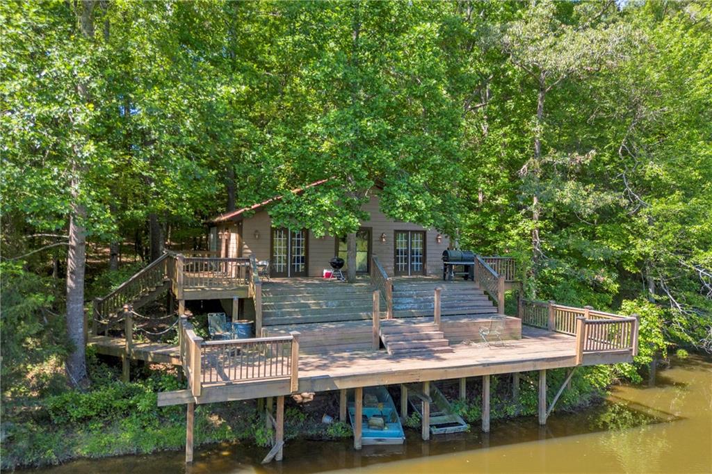 1641 Churchwell Rd Union Point Union Point, GA 30669 - Photo 2 of 45 a view of house with roof deck and seating space