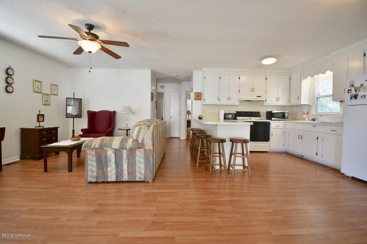 563 Roxboro Street Southeast Bolivia, NC 28422 - Photo 13 of 28 Living and Kitchen