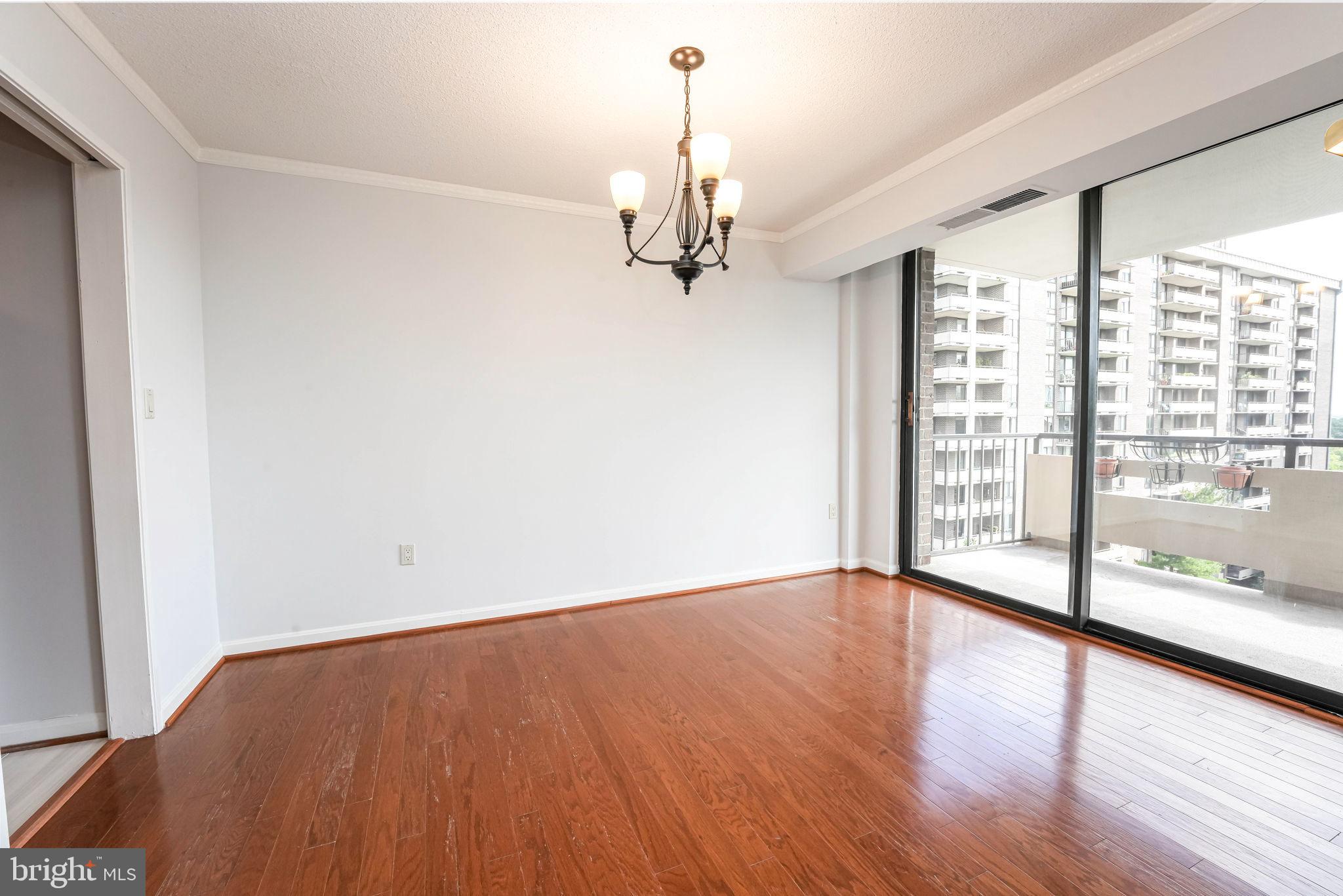 1808 Old Meadow Road, Unit 912 McLean, VA 22102 - Photo 11 of 33 Sliding door to Balcony from Dining room