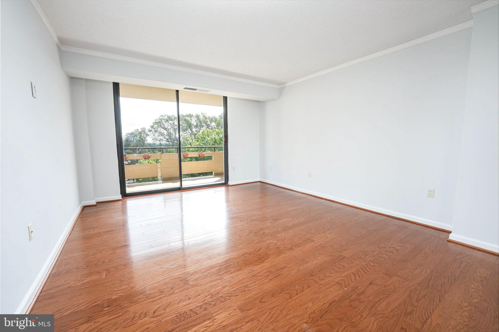 1808 Old Meadow Road, Unit 912 McLean, VA 22102 - Photo 18 of 33 Primary Bedroom with access to a second balcony
