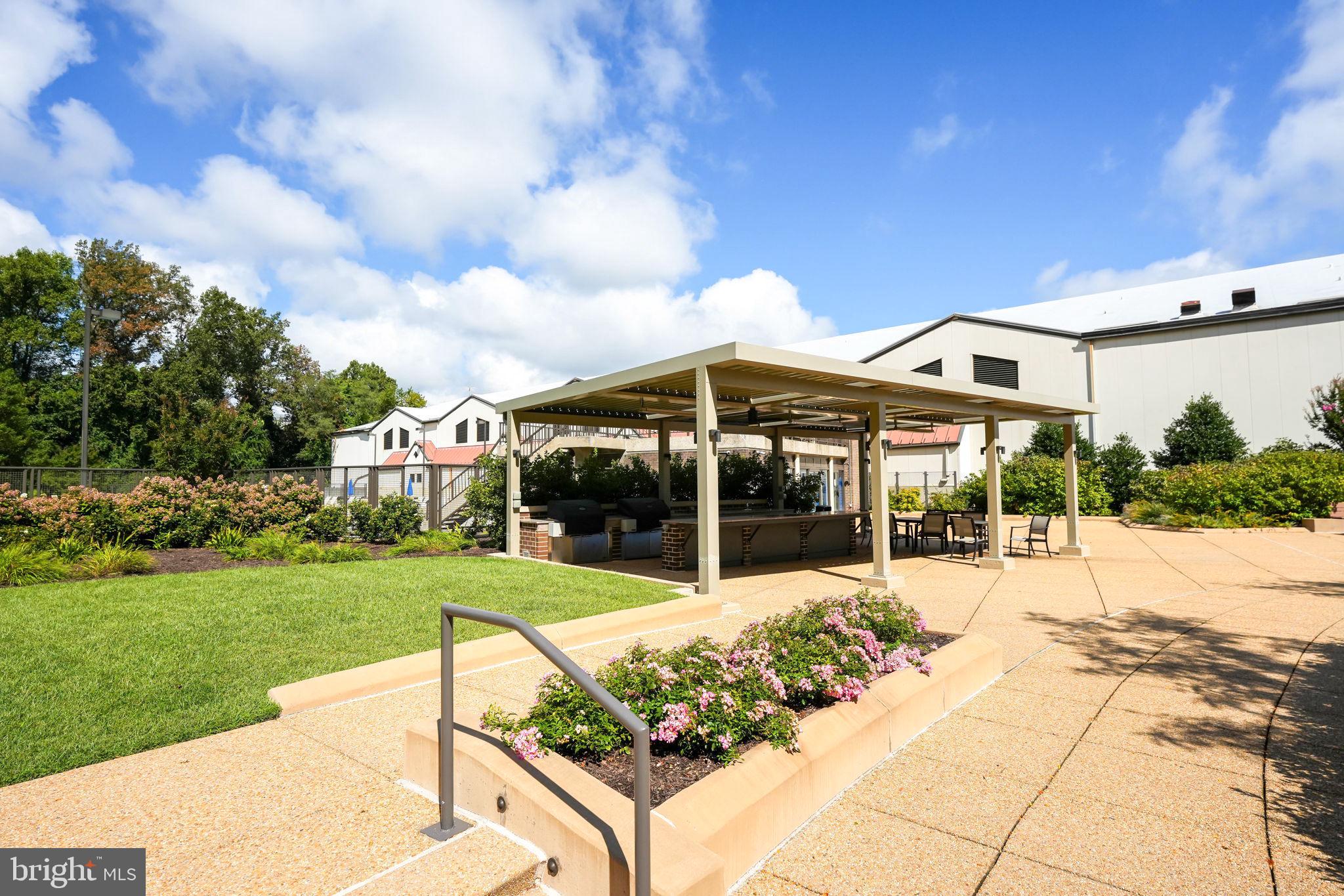 1808 Old Meadow Road, Unit 912 McLean, VA 22102 - Photo 29 of 33 Patio by the pool area