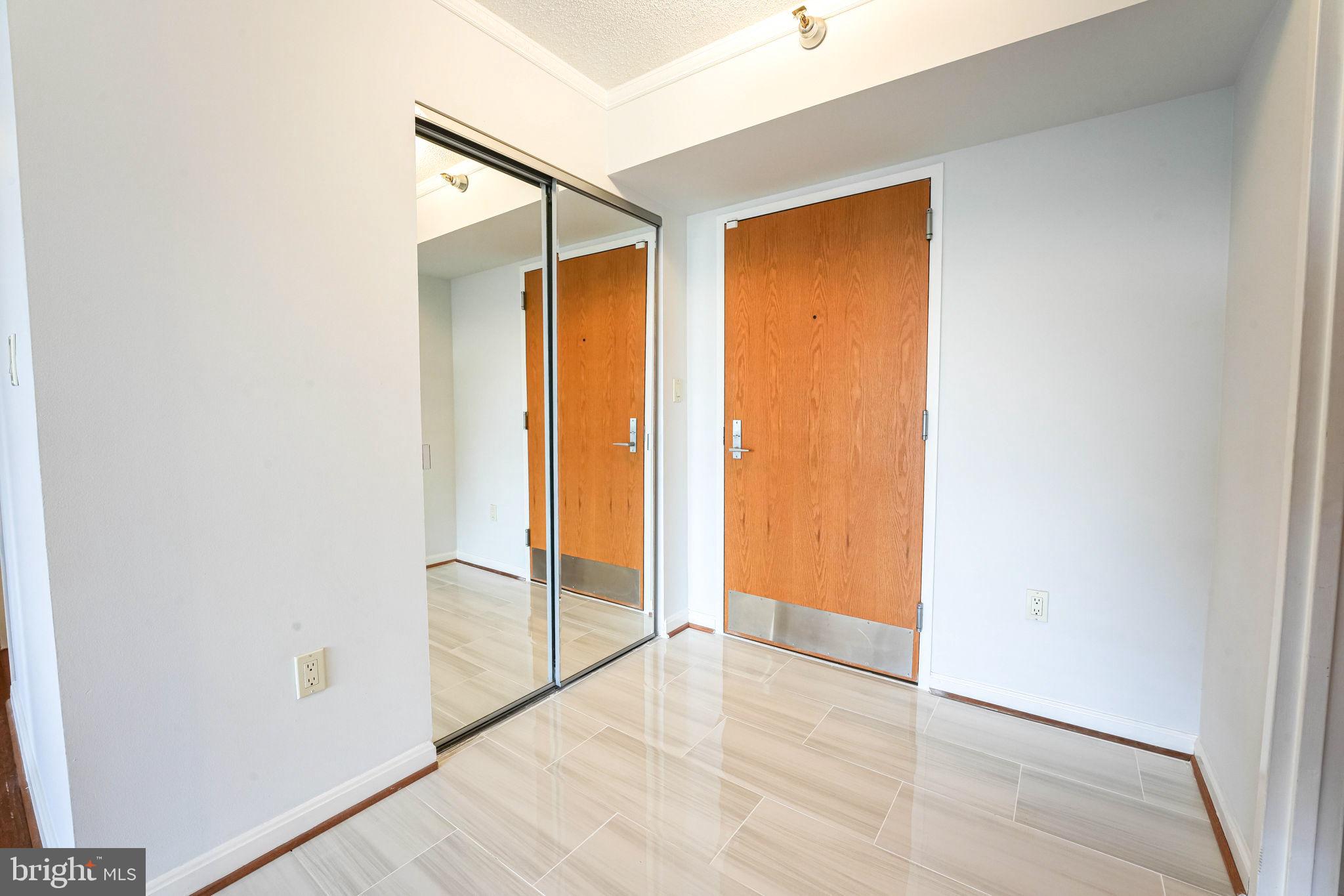 1808 Old Meadow Road, Unit 912 McLean, VA 22102 - Photo 3 of 33 Foyer with New Marble
