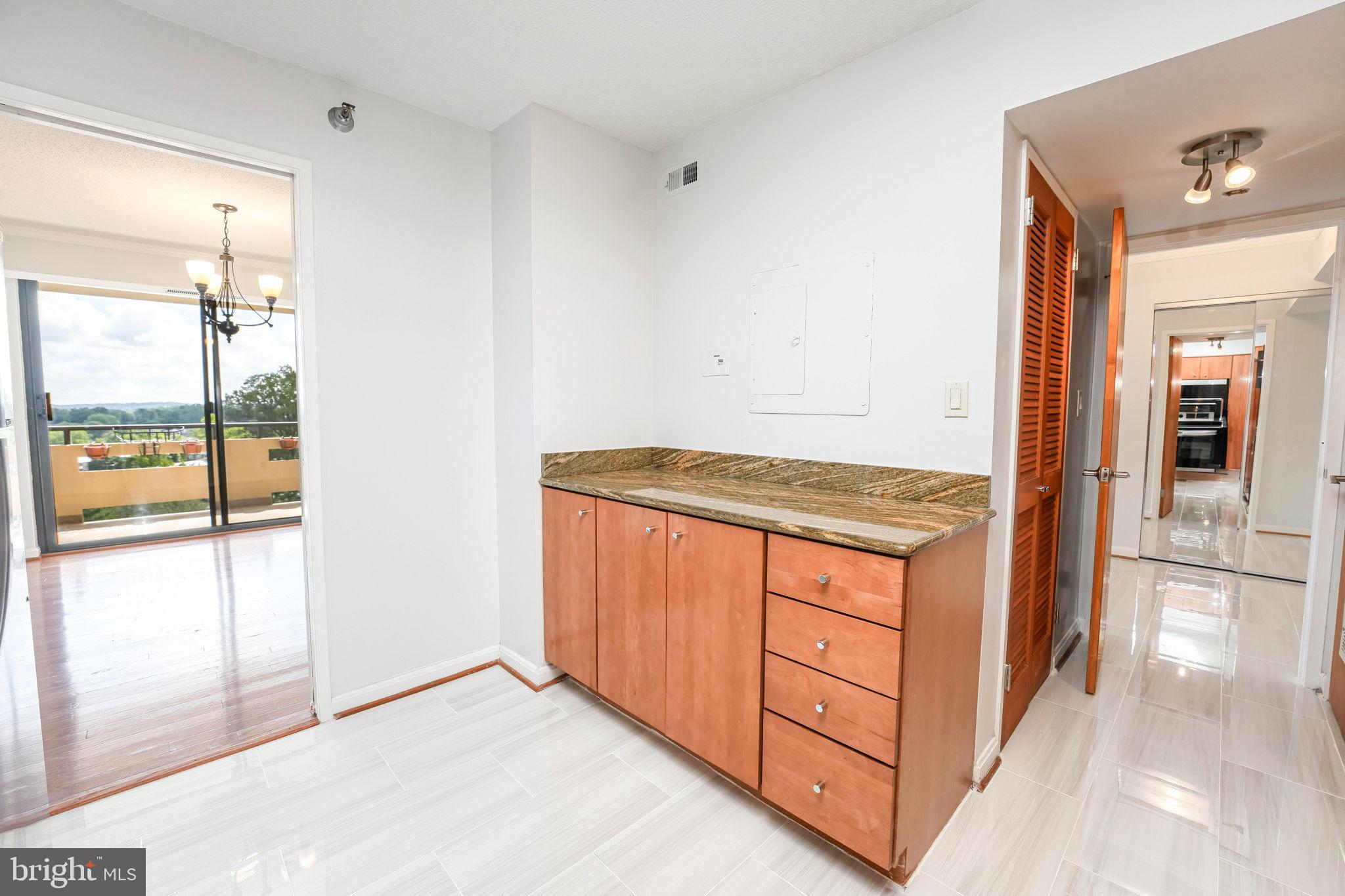 1808 Old Meadow Road, Unit 912 McLean, VA 22102 - Photo 7 of 33 More counter space with pull-out shelves