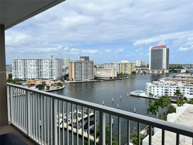 a view of swimming pool from a balcony
