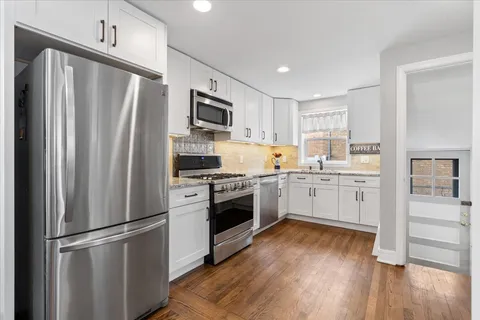 $440,000 | 5542 North Osceola Avenue, Chicago, IL 60656