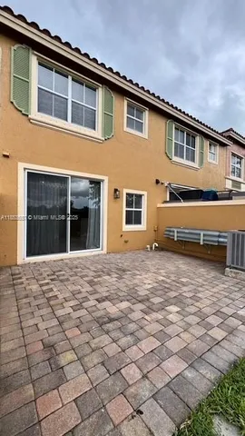 a house view with a outdoor space