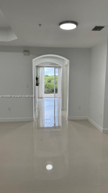 14384 Southwest 11th Street, Unit 904 Pembroke Pines, FL 33027 - Photo 6 of 22 a view of an empty room with a window