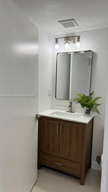 14384 Southwest 11th Street, Unit 904 Pembroke Pines, FL 33027 - Photo 7 of 22 a bathroom with a sink and a mirror