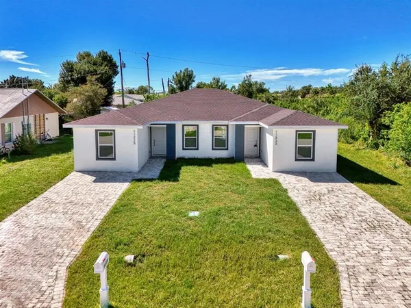 a house with garden in front of it