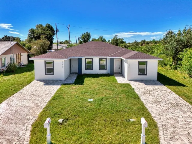 a house with garden in front of it
