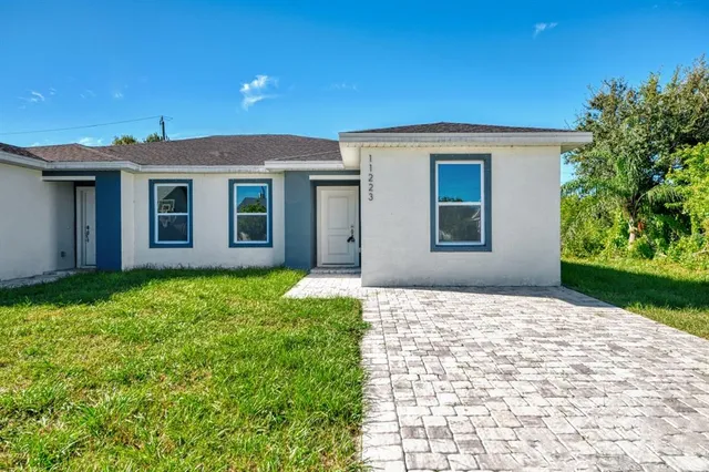 a view of a hallway with wooden shelves