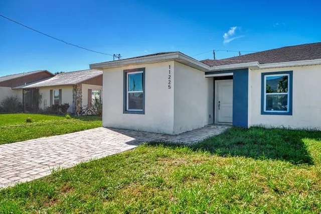 a bathroom with a toilet a bath tub and a shower