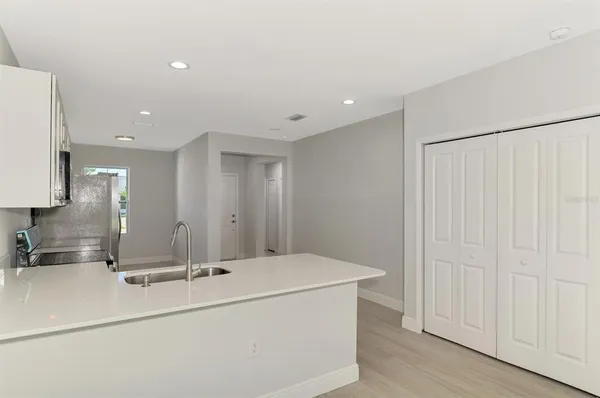 a view of house with a yard