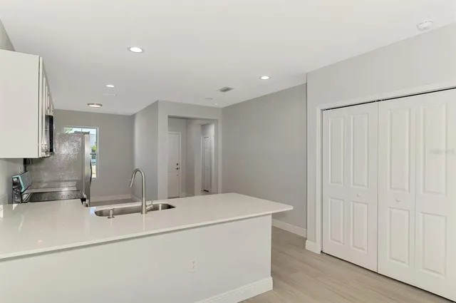 a view of house with a yard