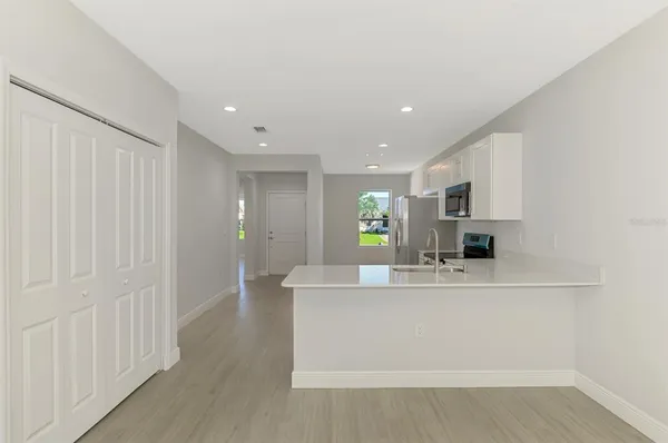 a storage room with furniture and a window