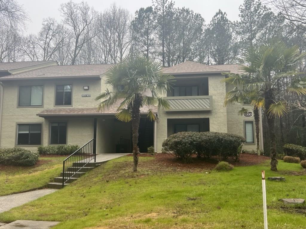 a house view with a garden space