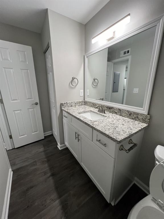 1035 Seasons Parkway Norcross, GA 30093 - Photo 6 of 22 a bathroom with a granite countertop sink and a mirror