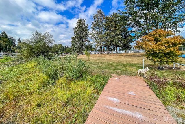 a view of street with a yard