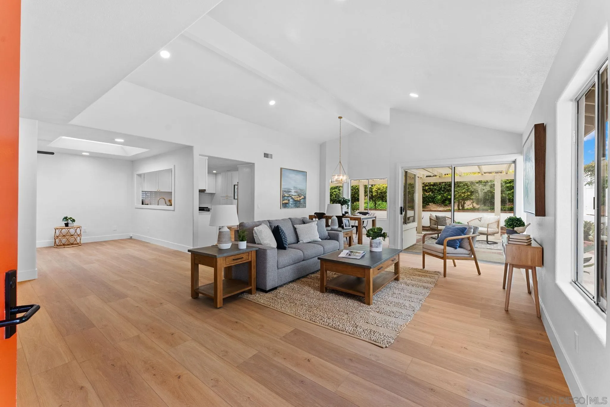 4695 Adra Way Oceanside, CA 92056 - Photo 9 of 29 a living room with furniture and a wooden floor
